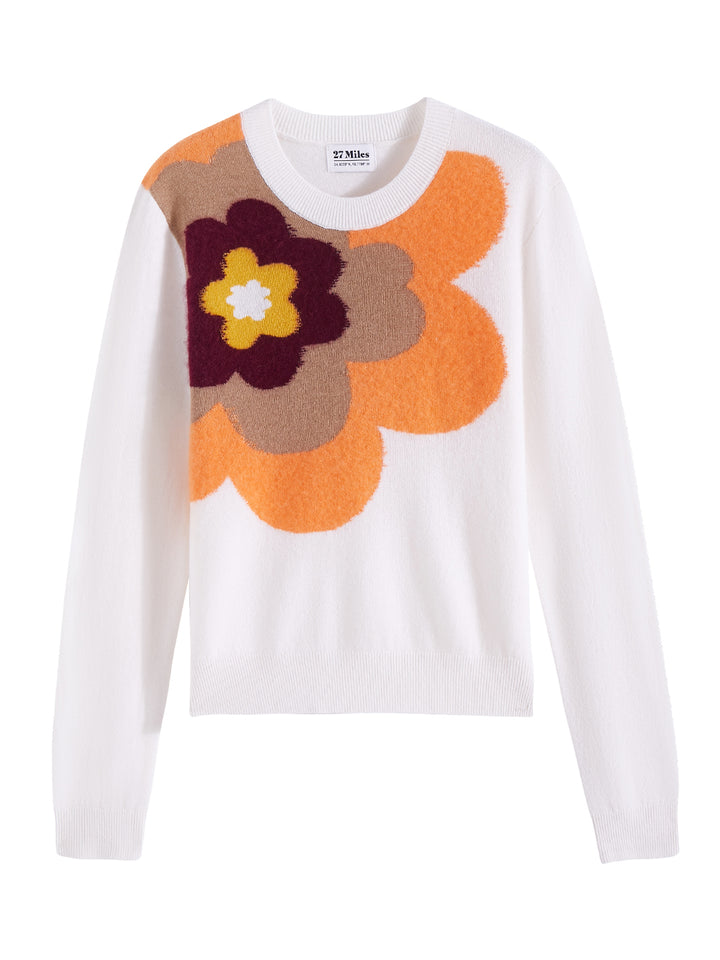 Flatlay photo of Alston in chalk white. The sweater is straight fit and made of cashmere, wool, and silk. The sweater is a crewneck pullover and has a large retro flower intarsia artwork.